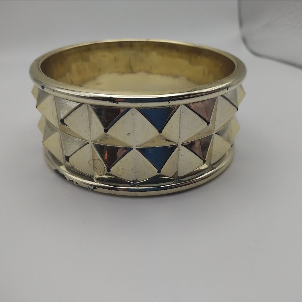 Gold toned (plastic) warrior bracelet